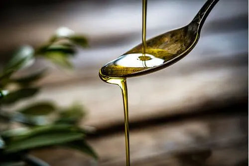 Tablespoon of olive oil showing nutrition and health benefits